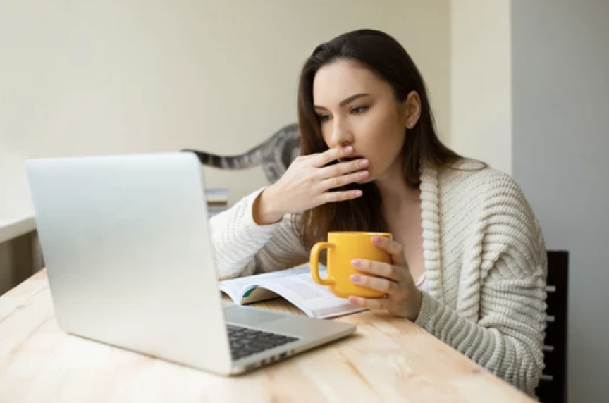 girl at laptop surprised only fans leaks